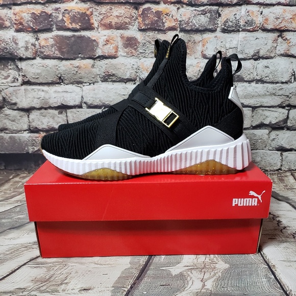 puma defy varsity mid black & gold shoes